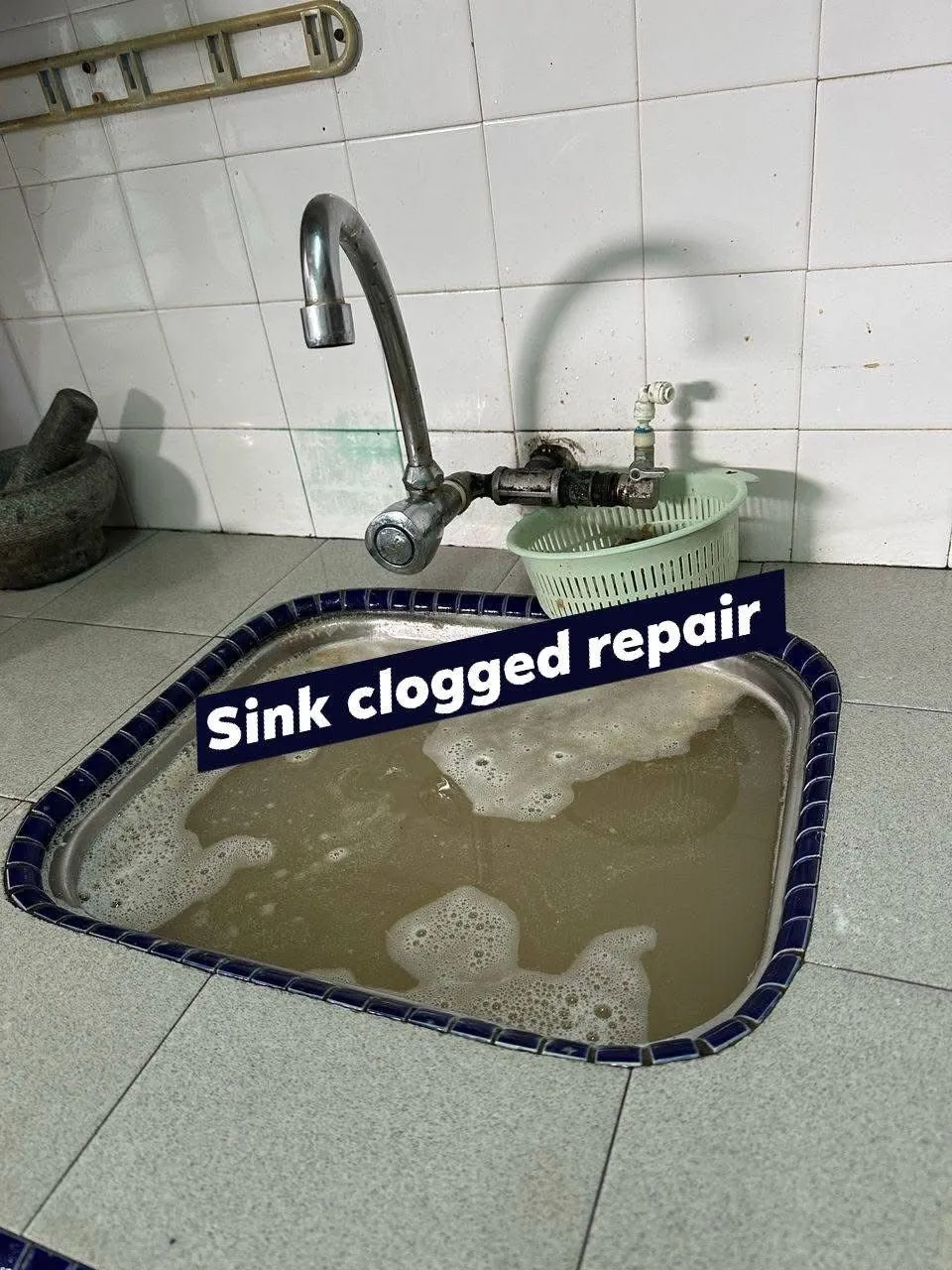 Sink drainage repair being assessed