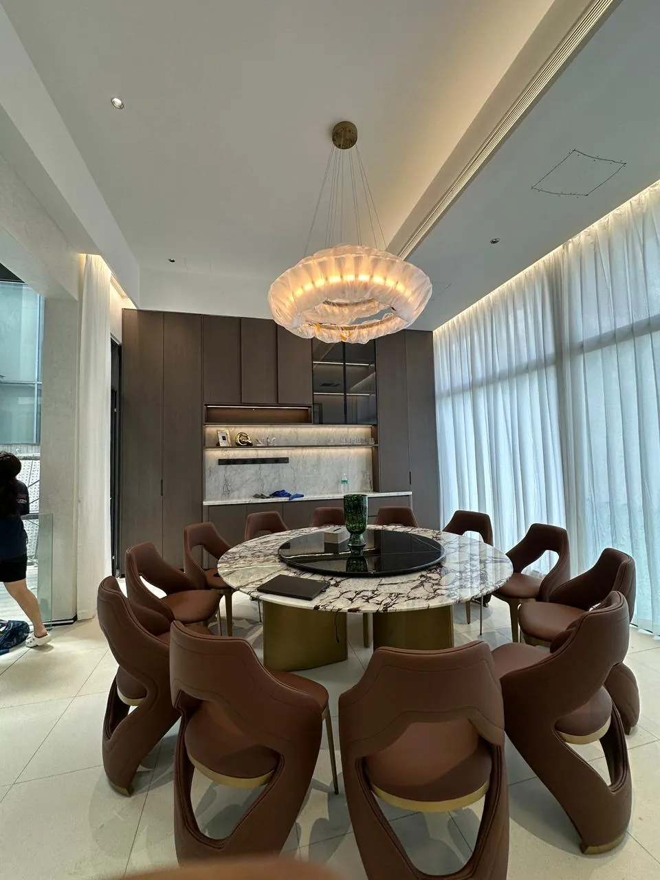 Completed dining table and chair assembly in a modern Malaysian home